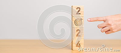 2024 year block with dartboard icon. Goal, Target, Resolution, strategy, plan, Action, mission, motivation, and New Year start Stock Photo