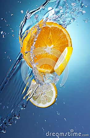 3 Citrus Slices with Water Splash Stock Photo
