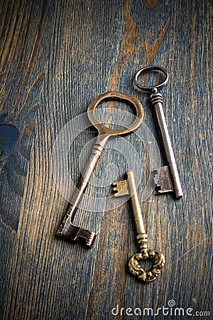 3 Keys on a Table Stock Photo
