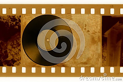 35mm frame photo with vintage vinyl disk Stock Photo