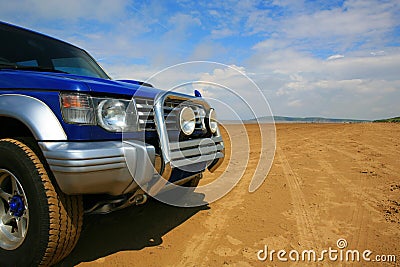 4 x 4 on deserted beach Stock Photo