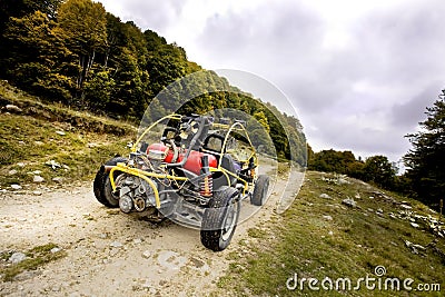 4wd buggy for extreme off-road shot on mountain Stock Photo