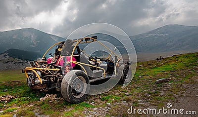 4wd buggy for extreme off-road shot on mountain Stock Photo