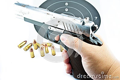 9-mm handgun and target shooting Stock Photo