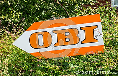 AACHEN, GERMANY OCTOBER, 2017: OBI market sign on a shield. Obi is the largest hardware and do-it-yourself retailer in Germany Editorial Stock Photo