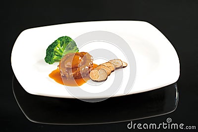 Abalone and goose liver Stock Photo