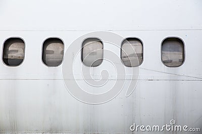 Abandoned airplane window Stock Photo