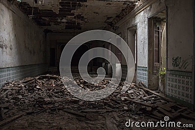 Abandoned auditorium full of rubble Stock Photo