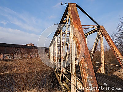Abandoned bridge to the old factory Stock Photo