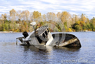 Abandoned broken boat Stock Photo