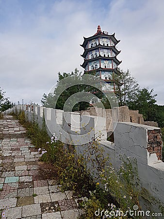 An abandoned Buddhist pagoda in the small Chinese city of Hunchun. Stock Photo