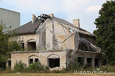 Abandoned building with broken windows Stock Photo