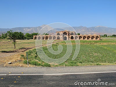 An abandoned building in the style of Islamic architecture in The Iranian steppe Stock Photo