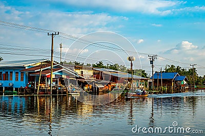 Abandoned Canal Village and Longtail Boat Riding Editorial Stock Photo
