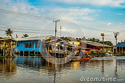 Abandoned Canal Village and Longtail Boat Riding Editorial Stock Photo