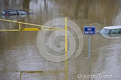 Abandoned Cars Submerged In Flood Water In Parking Lot In Oxfordshire UK January 2024 Stock Photo