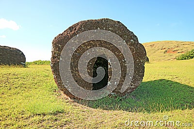 Abandoned Carved Moai Statues` Huge Topknots Called Pukao Scattered on Puna Pau Volcano, the Red Scoria Quarry on Easter Island Stock Photo