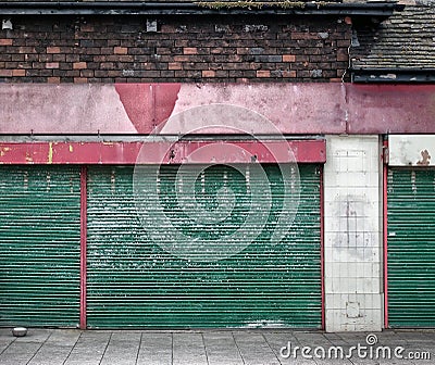 Abandoned closed shop with decaying facade Stock Photo