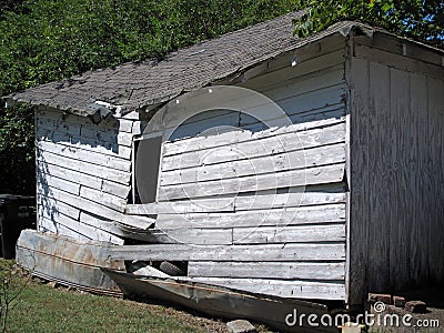 An Abandoned Collapsed Wooden Shack. Stock Photo