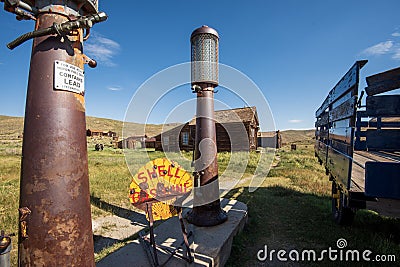 Vintage Shell gasoline sign and antique gas pump at ghost town of Bodie, California Editorial Stock Photo