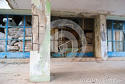 Abandoned devastated hospital main entrance Stock Photo