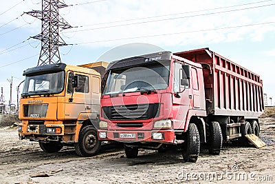 Abandoned dump trucks Editorial Stock Photo