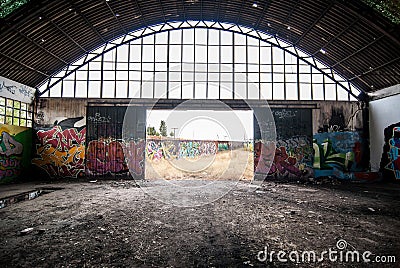 Abandoned factory, destroyed with graffiti on the walls Stock Photo