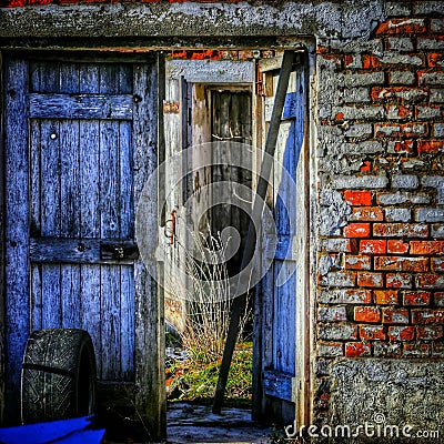 Abandoned farm door Stock Photo