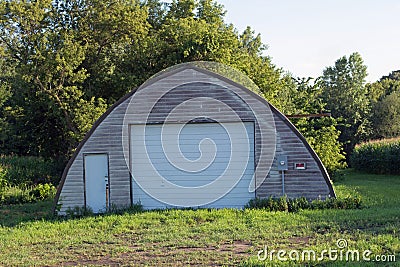 An Abandoned Farm Machine Shed Stock Photo