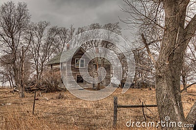 Abandoned Farmhouse in South Dakota slowly decays Stock Photo