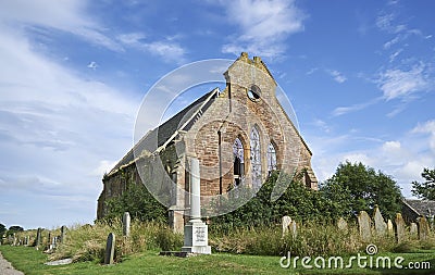 The abandoned and fast decaying Kinnell Parish Church lit up by the Summer Sun. Editorial Stock Photo