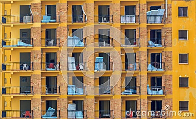 An abandoned flat building in Malaga, containing mattresses, tables and chairs. Stock Photo