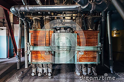 Abandoned flour milling factory. Old rusty grain cleaning air separation machine Stock Photo