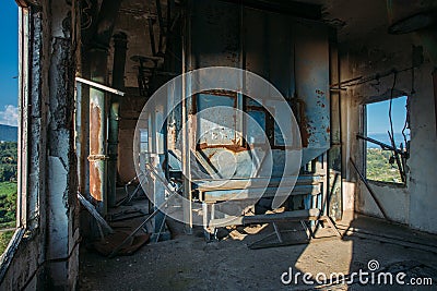 Abandoned flour milling factory. Rusty grain bunkers Stock Photo
