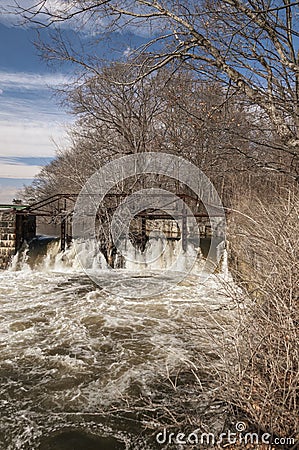 Abandoned flow control gates on Blackstone River Stock Photo