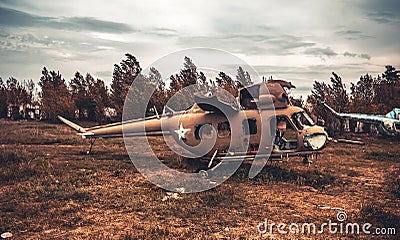 Abandoned helicopter at the airfield Stock Photo