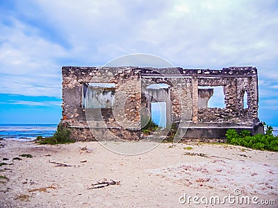 Abandoned hidden riun of bi khole in zanzibar Stock Photo