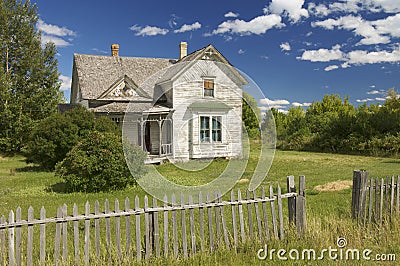 Abandoned house in a meadow Stock Photo