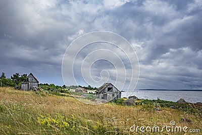 Abandoned houses in the Baltic Sea. Shore, nature and ruins facilities architecture concept. Stock Photo