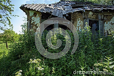 Abandoned houses in the countryside where agricultural workers lived, which became a retro style of Tarkovsky in the summer. Stock Photo