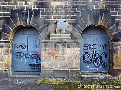 Abandoned industrial building in england with graffiti Editorial Stock Photo