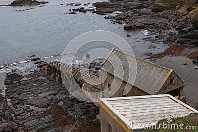 Abandoned life boat station Polpeor Cove. The Lizard Stock Photo
