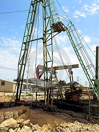 Abandoned oil rigs. Jacks of the oil pump Stock Photo