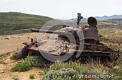Abandoned old rusty tank on the dunes of Lemnos island, Greece Stock Photo