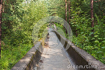 Abandoned Olympic Bobsleigh / Bobsled and Luge Track, built for the Sarajevo Olympic Winter Games in 1984. Editorial Stock Photo