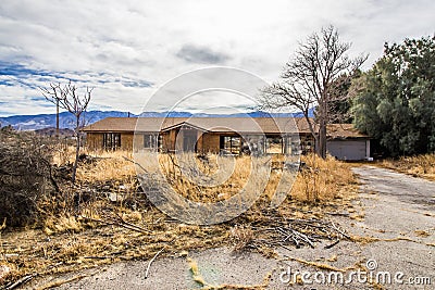 Abandoned One Level Home In Disrepair Stock Photo