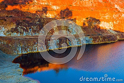 Abandoned open-pit mine of sulfide ore deposits in Sao Domingos, Portugal Stock Photo