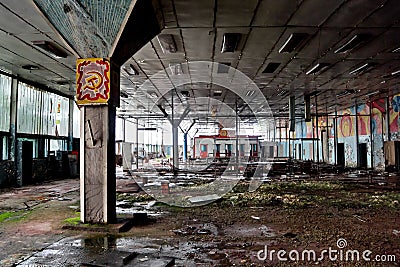 Abandoned, overgrown and decayed industrial building of Soviet electronics fact Stock Photo