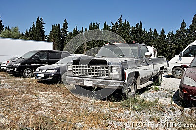 Abandoned parking in field Stock Photo