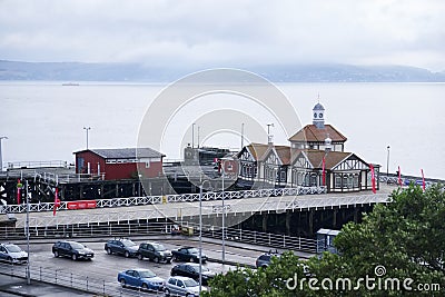 Abandoned pier sea coastal victorian wooden building derelict clouds water time lapse Dunoon Scotland UK Editorial Stock Photo
